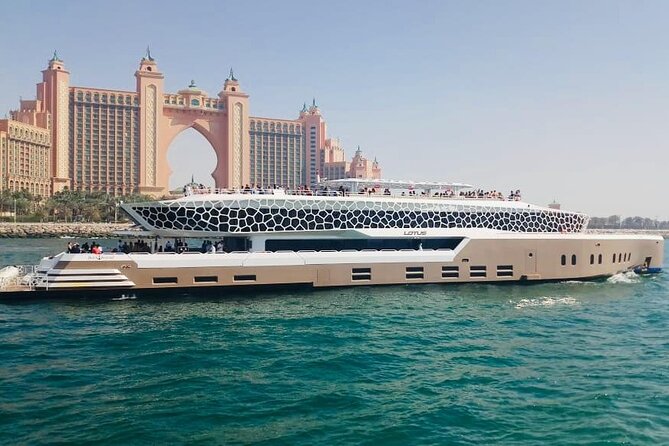 Lotus Mega Yacht Luxury Cruise with Live DJ, Dinner & Transfers - Palm Jumeirah and Atlantis The Palm from the water