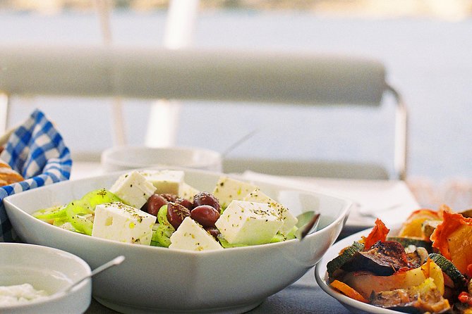 Luxury Catamaran Cruise from Athens with Traditional Greek Meal and BBQ - From your Athens hotel to Alimos Marina