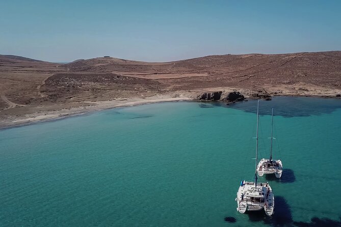 Luxury Catamaran Semi private cruise with meals & drinks and transportation. - A five-hour sailing day from Mykonos