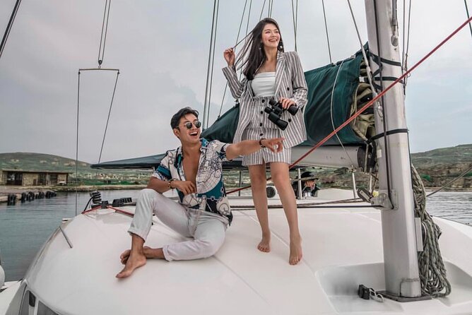 Luxury Catamaran Semi private cruise with meals & drinks and transportation. - Anchoring at Rhenia for swimming and snorkeling