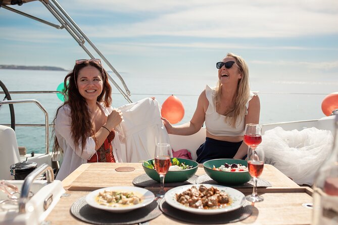 Luxury Catamaran Sunset Private & Greek Gastronomy in Athens - Vouliagmeni Beach and lunch on board