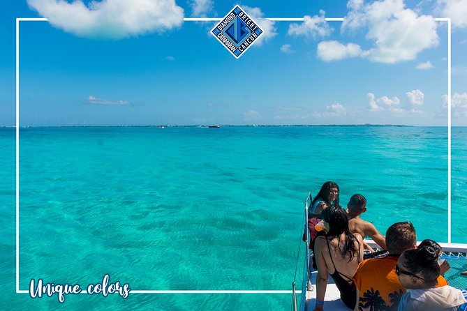 Luxury Catamaran tour to Isla Mujeres with Transportation from Cancun - Sunset, drinks, and the spinnaker ride