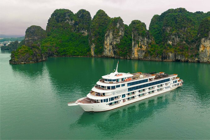 Luxury Cruise Full Day Explore Halong Bay - Titop Island, a short climb with a long view