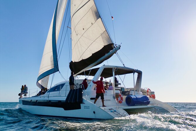 Luxury Sailing catamaran charter in Cabo San Lucas all inclusive - Snorkeling, paddle boards, and the floating mat
