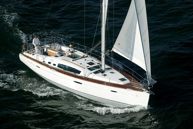Luxury Sailing Experience Day with Champagne and Lunch or Dinner - Champagne, then a choice at the helm