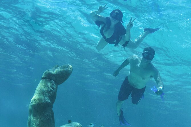 Luxury Sailing Experience to Isla Mujeres with Lunch & Open Bar - Paddle boards and the limits of the water activities