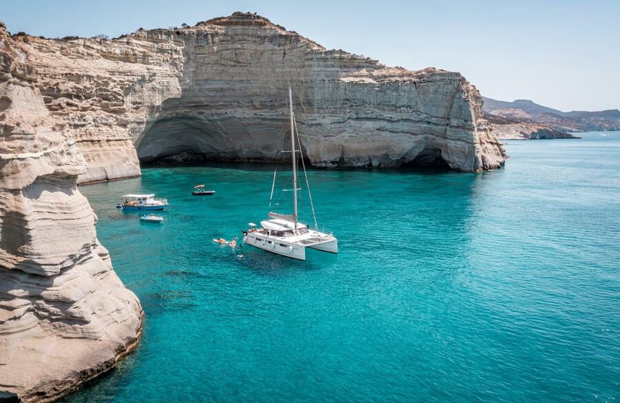 Milos: Full Day Luxury Catamaran with Full Meal & Open Bar - Setting sail from Adamantas