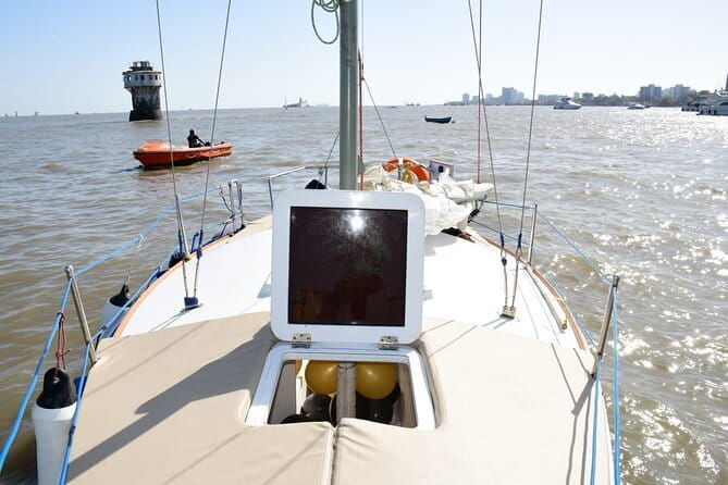 Mumbai Bay Breeze Sail on a Compact Yacht Experience - Dolphins, Ships, and the Luck of the Water