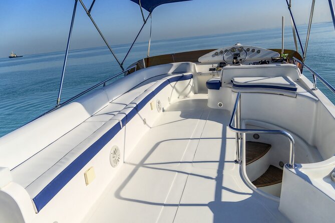 MY Cruises for Luxury Yacht Rental - Swimming, drinks, and time on deck