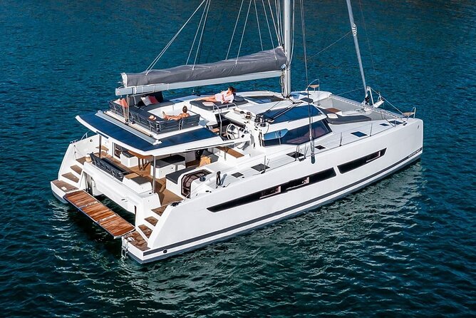 Mykonos: Luxury Catamaran Cruise with Meal, Drinks & Transport - Rhenia, the quiet side of the Cyclades