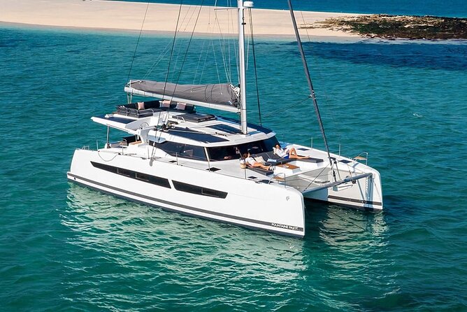 Mykonos: Luxury Catamaran Cruise with Meal, Drinks & Transport - Lunch, wine, beer, and the question of value