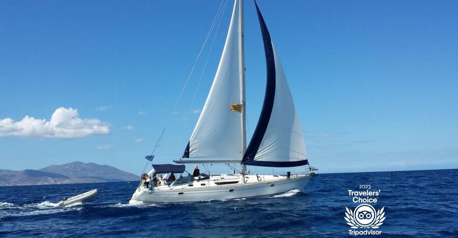 Mykonos: Yacht Cruise to Rhenia and Guided Tour of Delos - Walking through Delos with a licensed guide