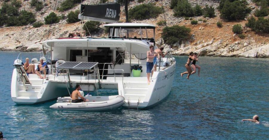 Naxos: Luxury Catamaran Day Trip with Lunch and Drinks - Swimming in clear water and using the snorkel gear