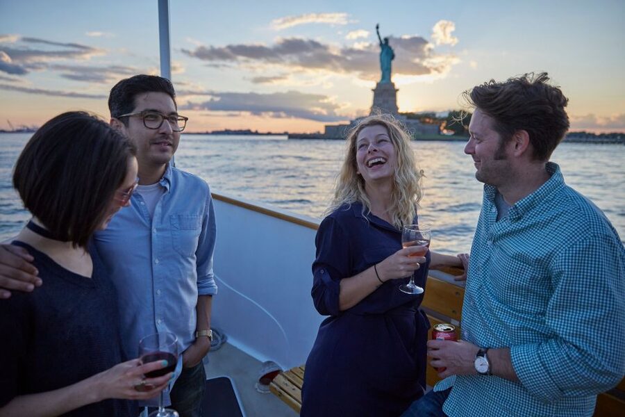 NYC: Sunset Cruise on a Small Yacht with a Drink - Lower Manhattan, Battery Park, and the Financial District