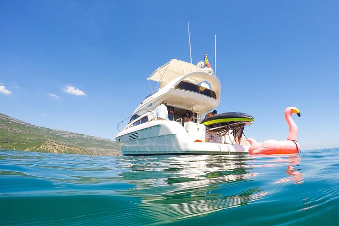 Ocean Bliss: Full Day Arrábida Private Yacht Tour from Lisbon - Sesimbra Castle and the beaches of Arrábida