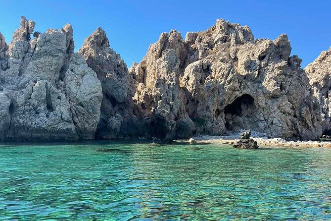 PAROS Private premium boat trip to Antiparos & Despotiko islands - The Paros coast and its quiet cave stop