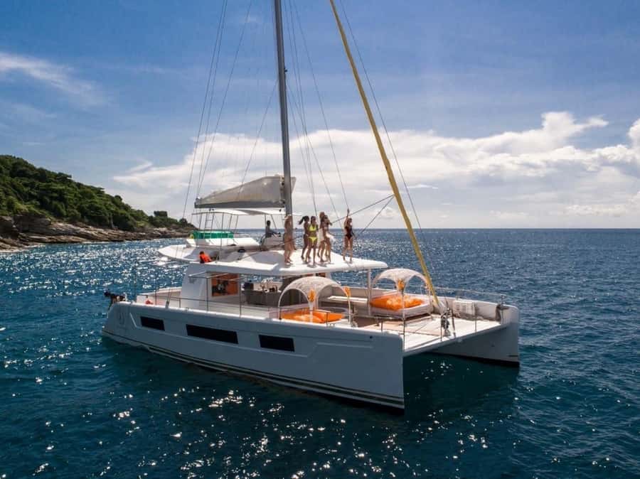 Phuket: Coral and Racha Island Yacht Tour with Lunch - Coral Island gives you an easy first swim