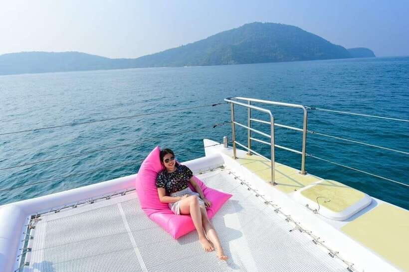 Phuket: Coral Yacht Boat Tour to Coral Island with Sunset - Pirates Beach, your first chance to swim