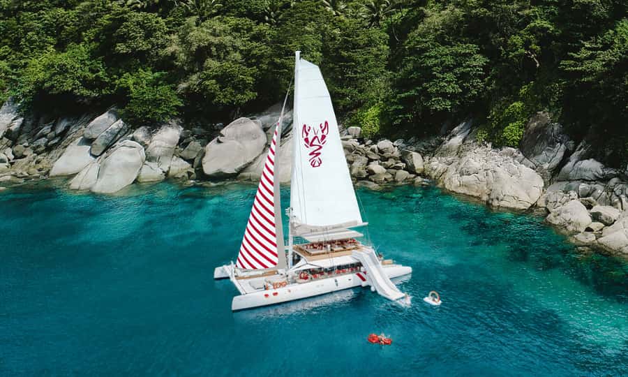 Phuket: Sailing Yacht Island Hopping & Party Full-Day Cruise - A full Phuket day with two very different island stops