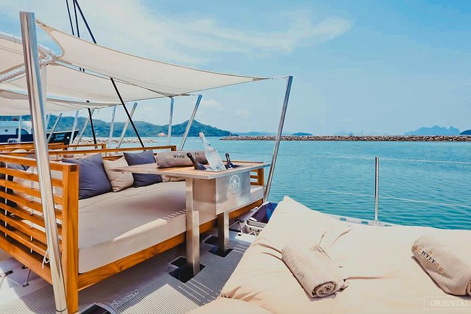 Phuket VIP Hype Luxury Boat Cruise with Party & DJ Vibes - Coral Island at 12:15: your first swim