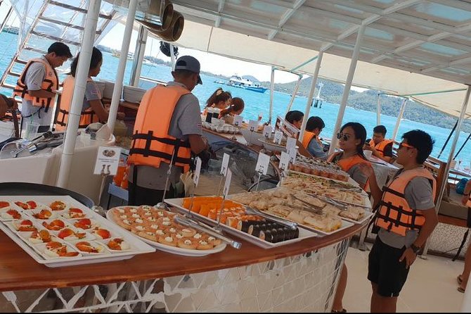 Phuket VIP Hype Luxury Boat Cruise with Party & DJ Vibes - Raya Yai Island at 3:00: swimming and snorkeling