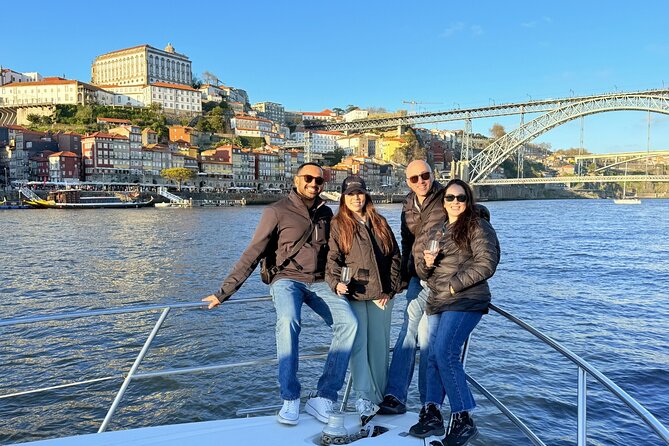Porto: Luxury Yacht Cruise with Wine Tasting & Snacks - Comfort in sunshine and rain