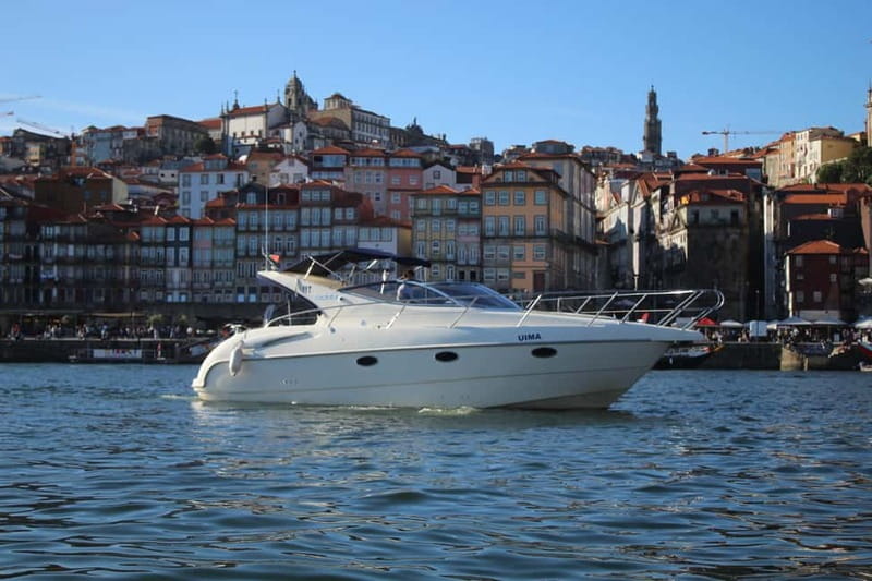 Porto: Private Yacht Tour with Wine, Snacks & 6 Bridges - Porto from the water, with Ribeira and Gaia in view