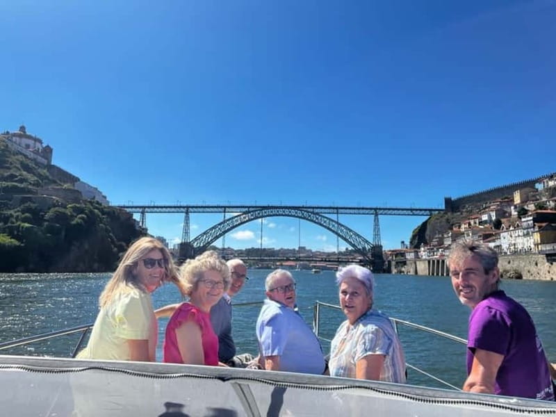 Porto: Private Yacht Tour with Wine, Snacks & 6 Bridges - Wine, regional snacks, and a private soundtrack