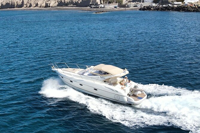 Private all included yacht Tour in Santorini - Fira, Firostefani, Imerovigli, and the Old Port from offshore