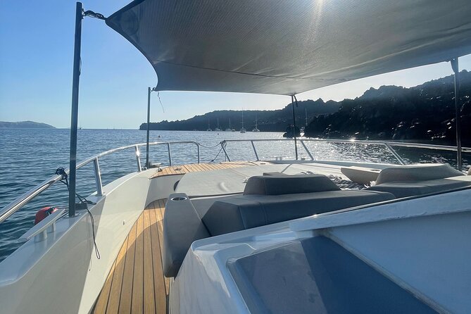 Private Caldera Cruise with Motor Yacht in Santorini - The volcanic hot springs and Santorini’s dark rock