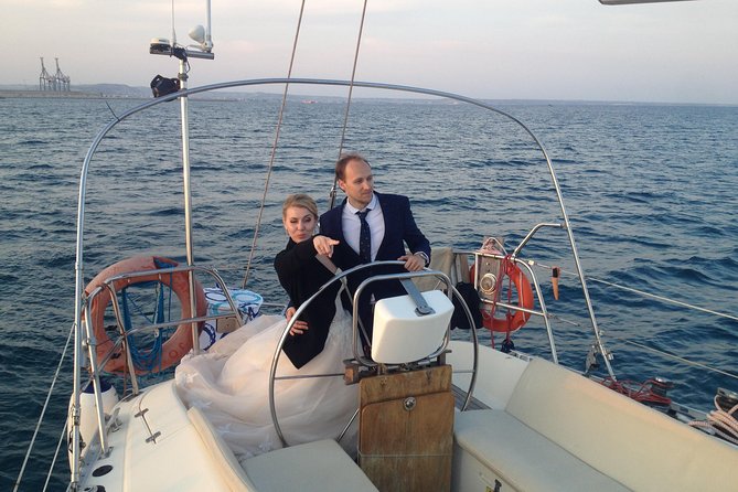 Private cruise with a sailing yacht Koursaros - Trying the helm under the skipper’s eye