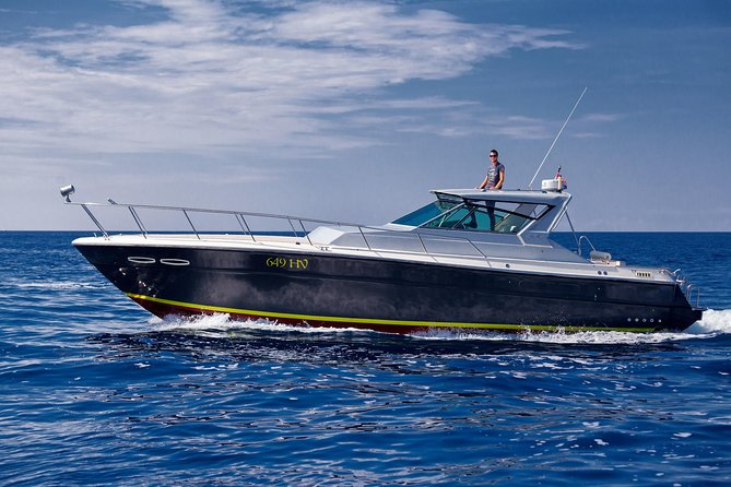 Private custom Blue & Green Cave tour with yacht from Hvar town - The Green Cave and its shafts of sunlight