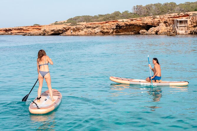 Private Full Day boat charter in Traditional Balearic Yacht - Swimming, snorkeling, and paddleboarding stops