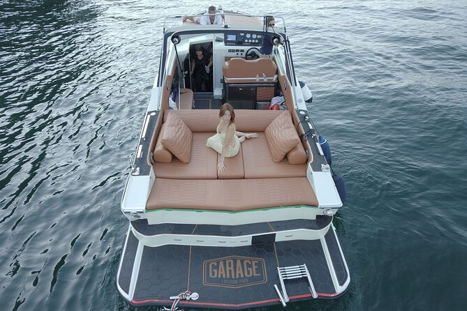 Private Lake Como Yacht Tour Experience on Colombo Boat - Villa Carlotta, art, and seasonal color