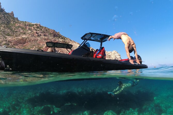 Private Luxury Boat Tour to Kleftiko Milos - Purple Cave adds color to the usual white-rock route