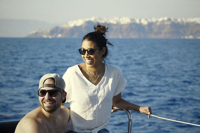 Private Luxury Santorini Catamaran Cruise with Port Pickup - Choosing between daytime and sunset