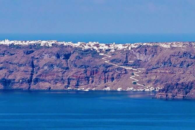 Private Motor Yacht Cruise with BBQ, Open Bar & Transfers - Why seeing Santorini from the sea matters