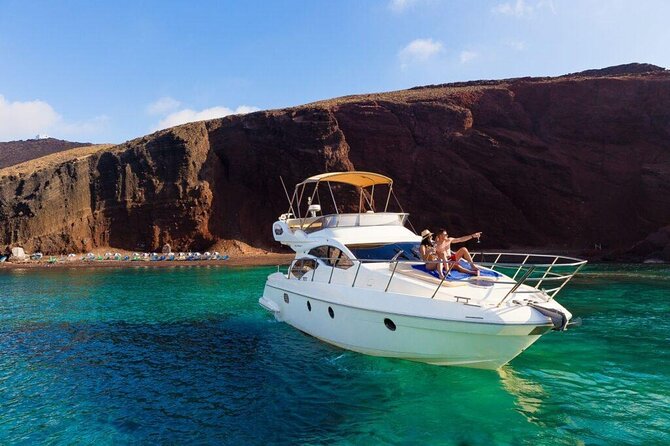 Private Motor Yacht Cruise with BBQ, Open Bar & Transfers - Red Beach and the cliffs of Akrotiri