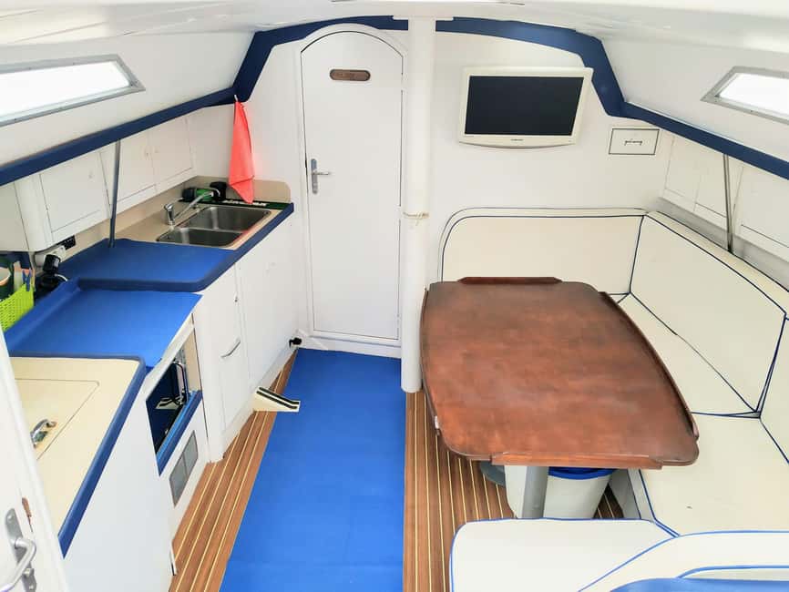 Private sailboat charter - coastal tour with snorkeling in the bay - One hour for swimming, snorkeling, and paddleboarding