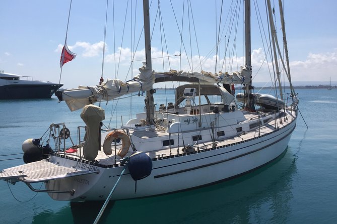 Sailing charter along the Maltese shoreline incl. Lunch and drinks - Captain Michael and the tone on board