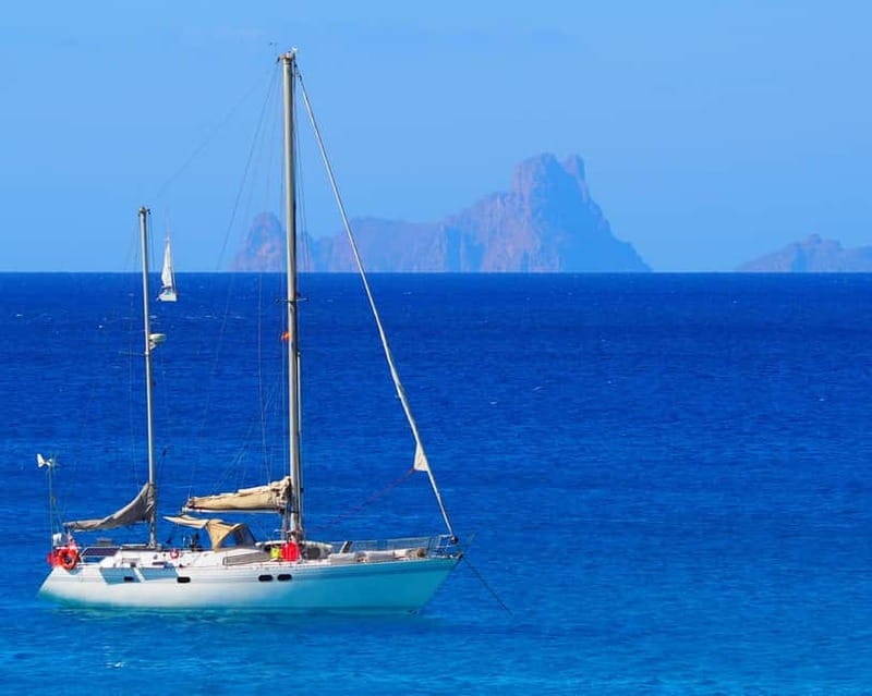 Sailing Yacht Day Charter; Ibiza to Formentera (return) - Paddleboarding, snorkeling, and swimming from the boat