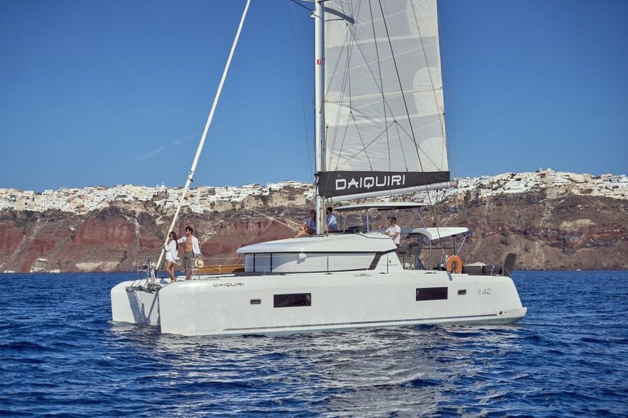 Santorini: Day Luxury Catamaran Cruise with Meal & Drinks - Fira’s Old Harbor and the return to Ammoudi