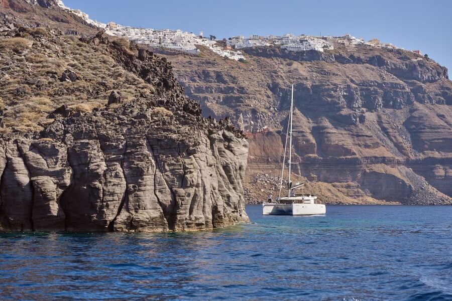 Santorini: Day Luxury Catamaran Cruise with Meal & Drinks - What to pack for four hours on the water