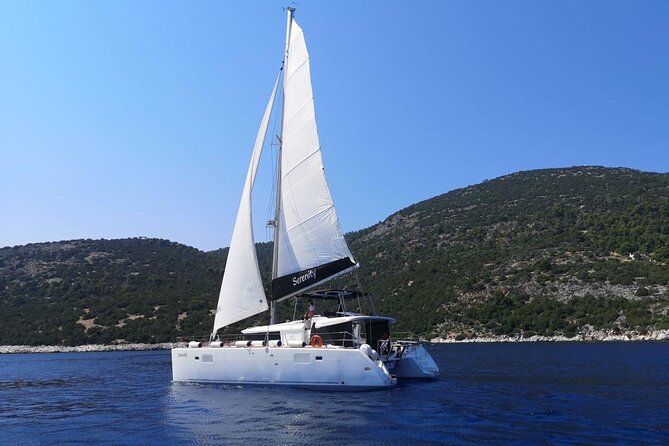 Santorini: Luxury Catamaran Cruise with Fresh Fish BBQ & Drinks - The volcano and sulfur springs near Nea Kameni