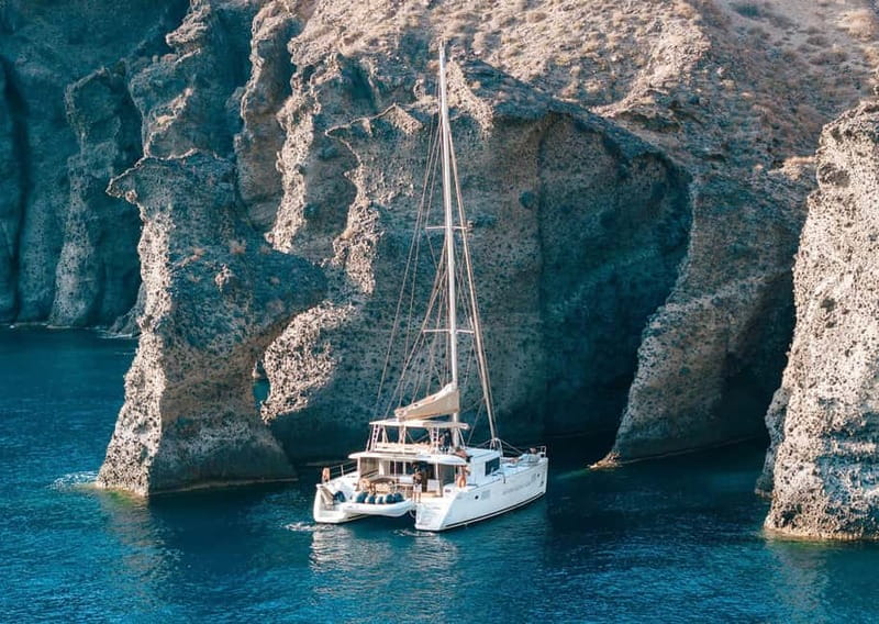 Santorini: Luxury Catamaran Cruise with Lunch, BBQ & Drinks - From your hotel to Vlychada Port