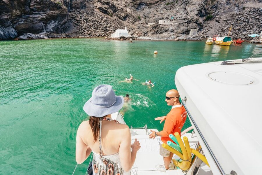 Santorini: Luxury Catamaran Day Trip with Meal and Open Bar - The volcanic hot springs near Palia Kameni