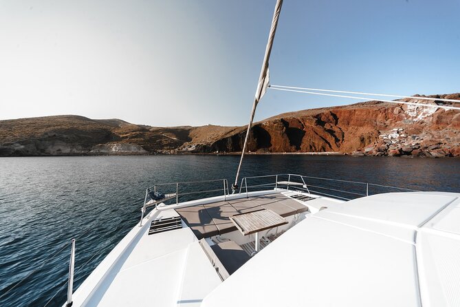 Santorini Luxury Catamaran Private Cruise - From Vlichada to the Red and White beaches