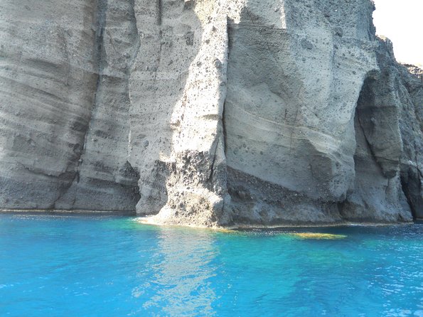 Santorini Luxury Catamaran Sunset Cruise with BBQ, Drink and Transfer - Sunset is the main event