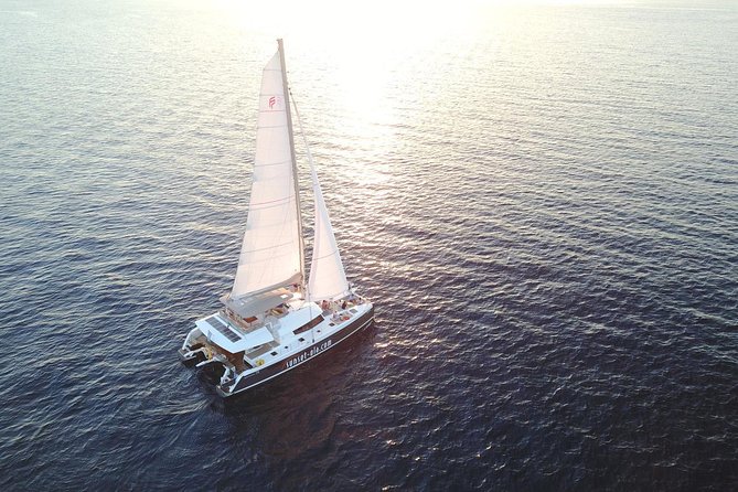 Santorini Luxury Catamaran Sunset Cruise with BBQ, Drink and Transfer - Volcano, Palea Kameni, and the hot springs