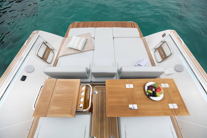 Santorini Private Luxury Yacht Sunset Cruise - Indian Rock and the Akrotiri lighthouse